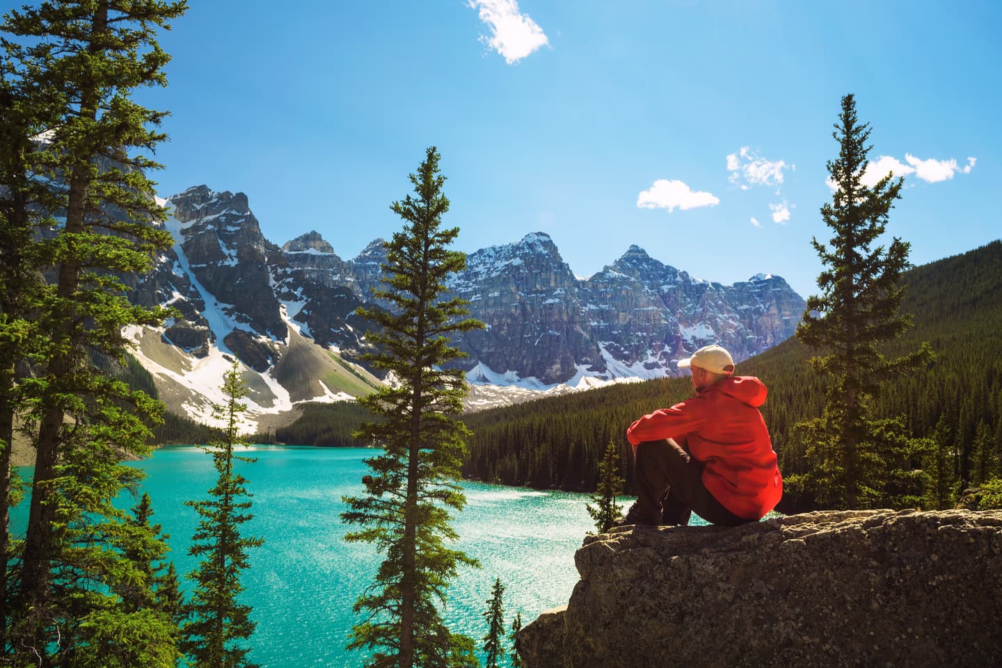 Hiker overlooking Banff National Park Lake