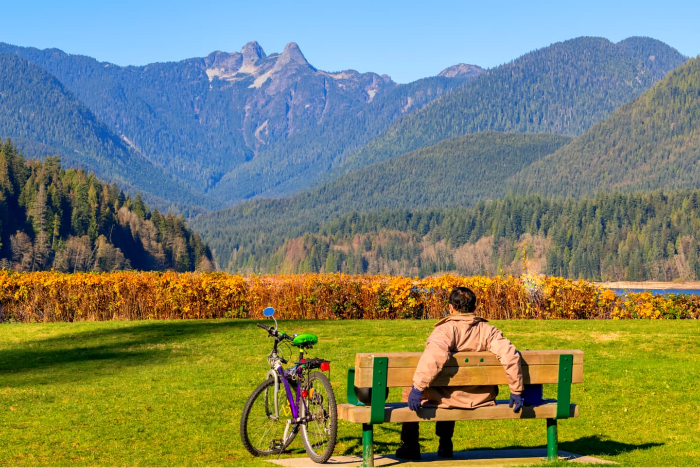 Man sitting on bench North Vancouver Canada