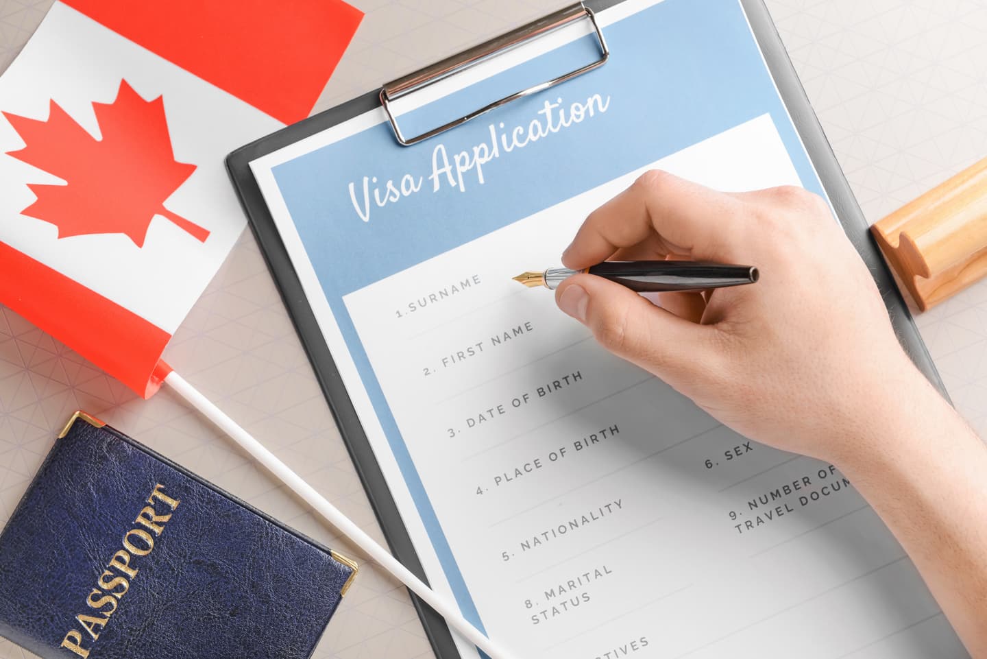 Person filling out a Canadian visa application